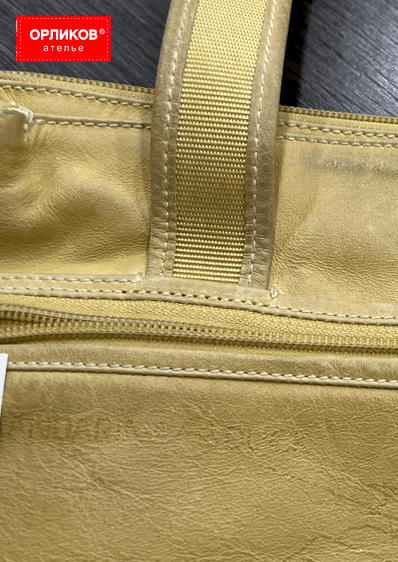 Ручки золотистой сумки после ремонта