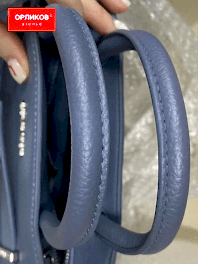 Ручки кожаной синей сумки после реставрации