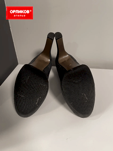 Женские черные туфли после установки профилактики