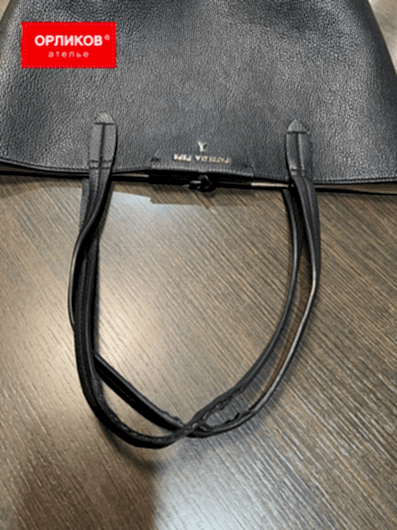 Ручки кожаной сумки до замены на новые изготовленные по образцу