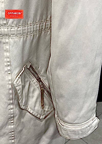 Белый пуховик после химчистки