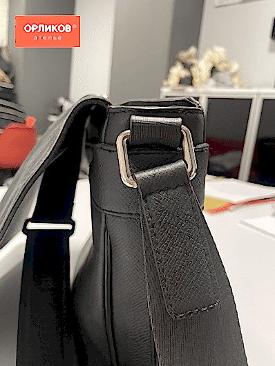 Детали на черной женской сумке после замены