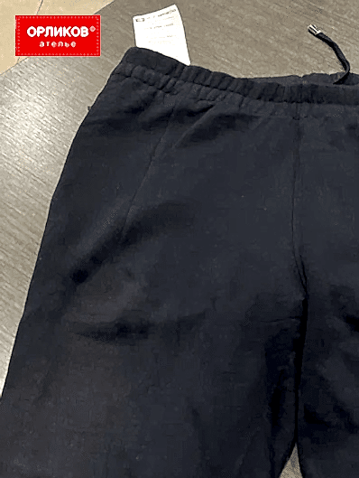 Прожженные спортивные штаны после ремонта