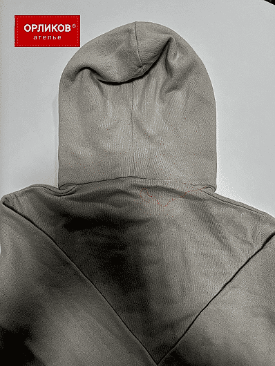 Трикотажная серая толстовка после реставрации и ремонта